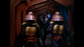 Draconian soldiers pass Kane in Draconia's corridor (BR25: Film, "Awakening").