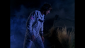 [Photo 4A]: A flipped shot of William "Buck" Rogers in the cemetery. This is a flipped image of the shot where Rogers comes across the Rogers family gravestone, as denoted by the mirror-opposite nature of his U.S. flag patch.