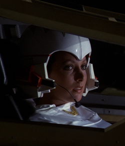 BR25 - Planet of the Slave Girls - Female Pilot at Vistula.png